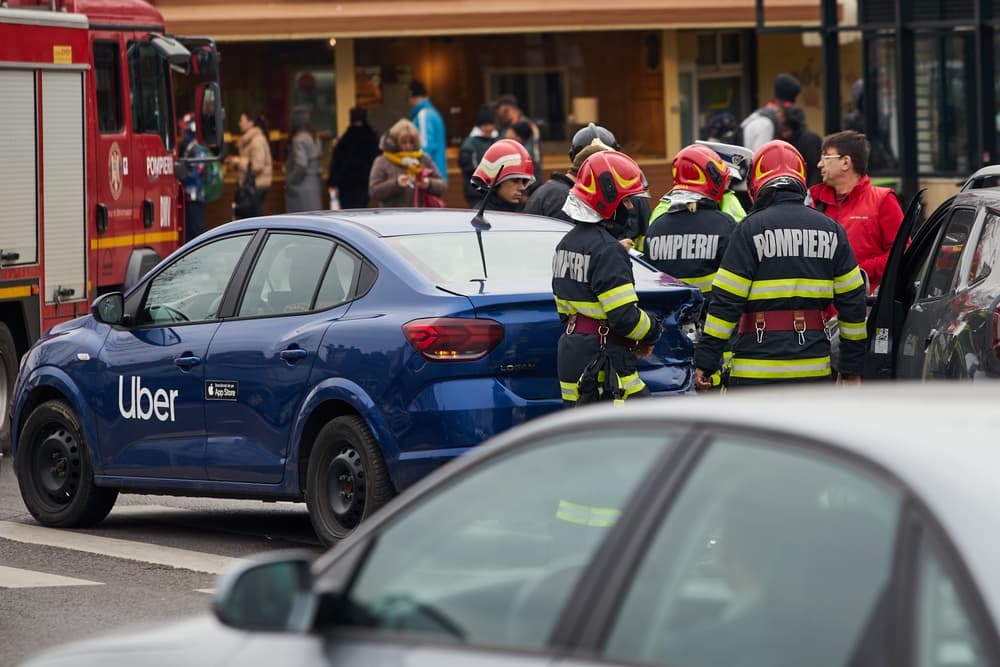 An Uber car on the road in the Bronx at the place where it was involved in an accident.